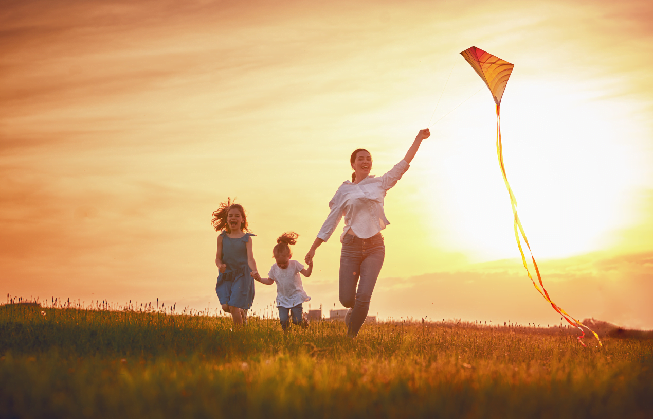 family flying a kite